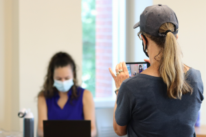 Neag School of Education Publicity and Marketing Administrator Shawn Kornegay takes a candid photo of graduate student Lauren Dougher (July 2021)