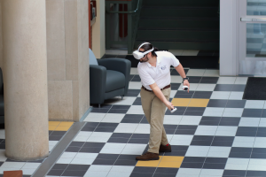 Graduate student Mike Cho tests out an Oculus Quest 2 (July 2021)